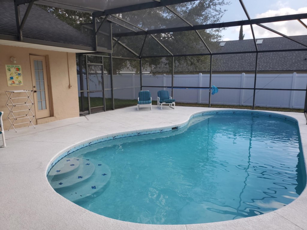 South west facing pool with privacy fence

