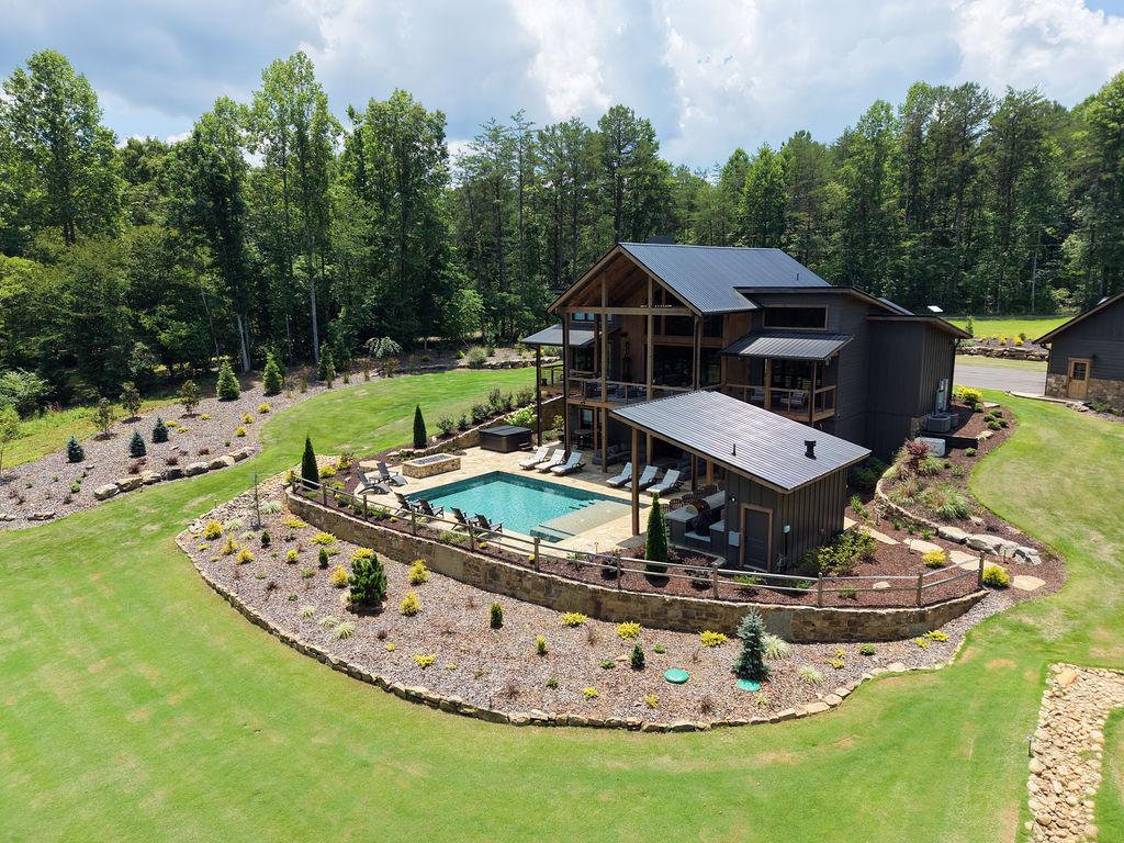 Luxury cabin with private pool and forest views, perfect for a serene getaway.