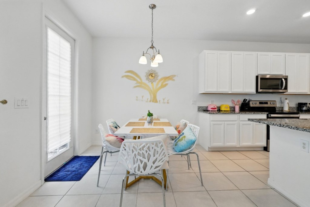 kitchen/dining area/back door to the back yard.