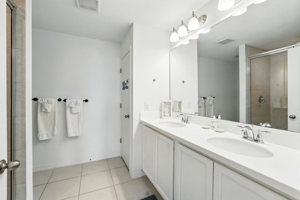 full bath with twin sinks...