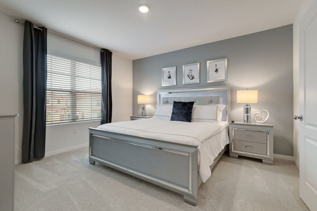 spacious bedroom and comfortable bed
