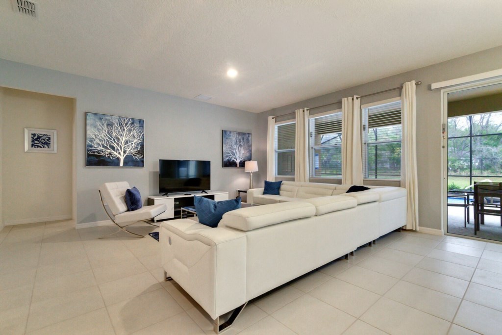 living room with a huge screen - perfect for watching a movie with your family!