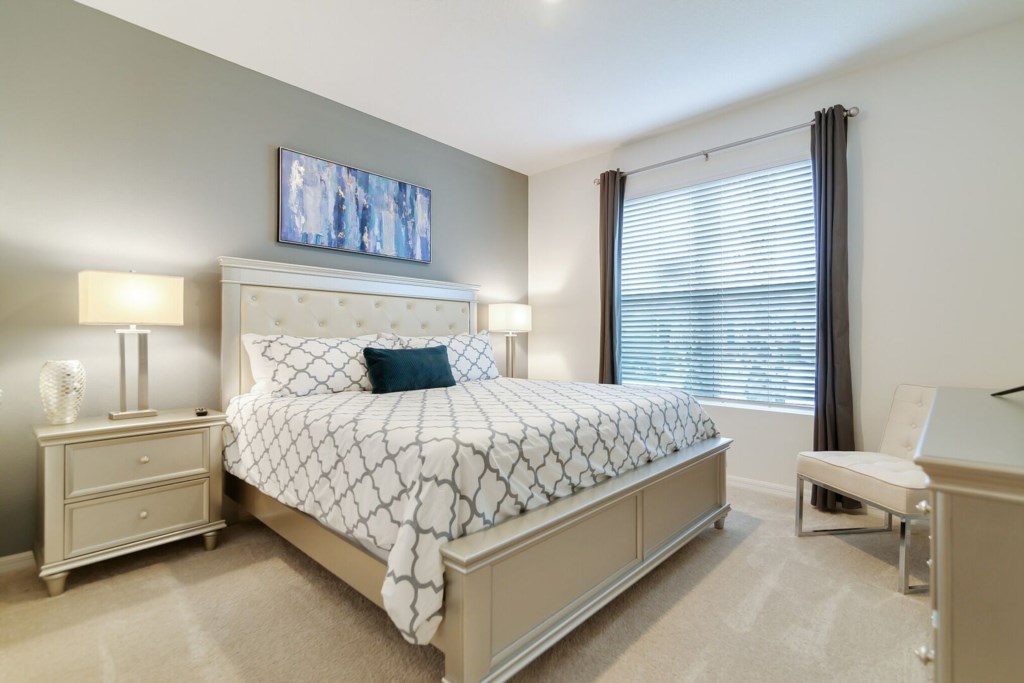 spacious bedroom and comfortable bed