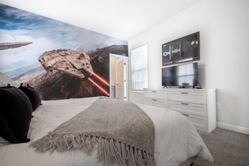 bedroom with its own TV