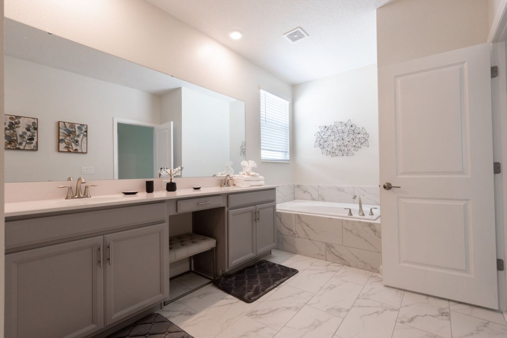 twin sink and bathtub