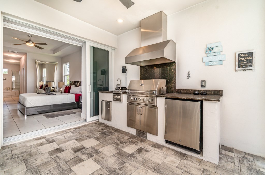 Efficient studio layout with modern kitchenette, opening into a cozy sleeping area.