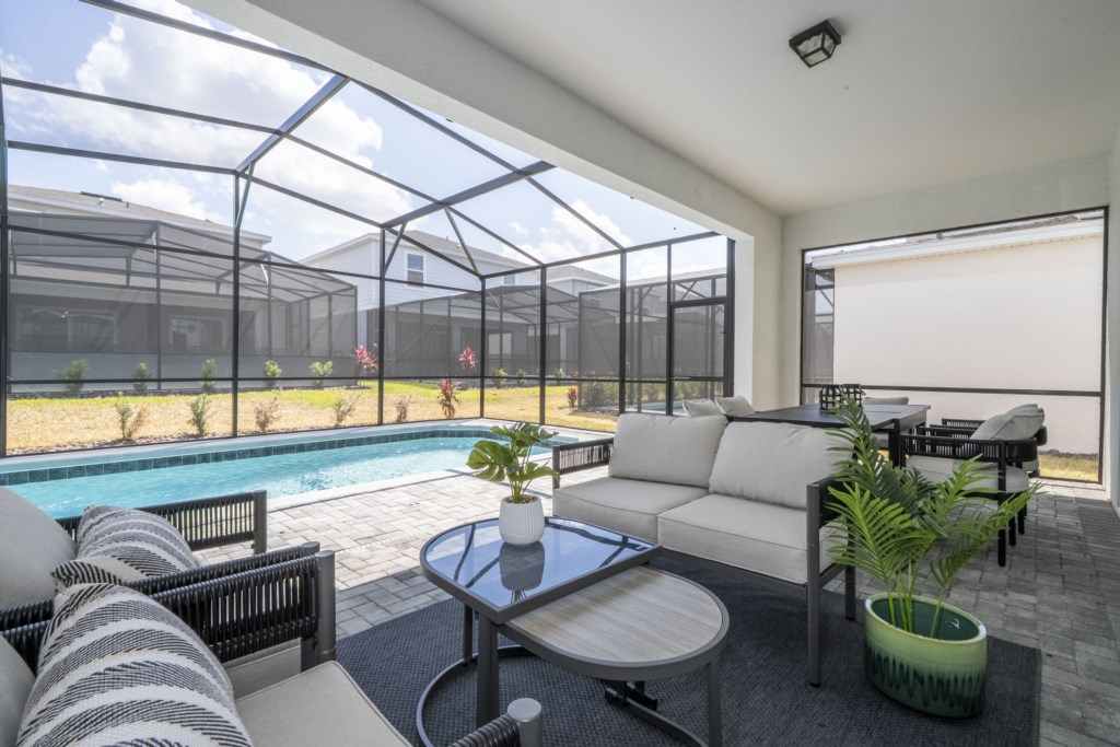 Pool Area w/ Outdoor Seating. Pool heat available at an additional charge.
