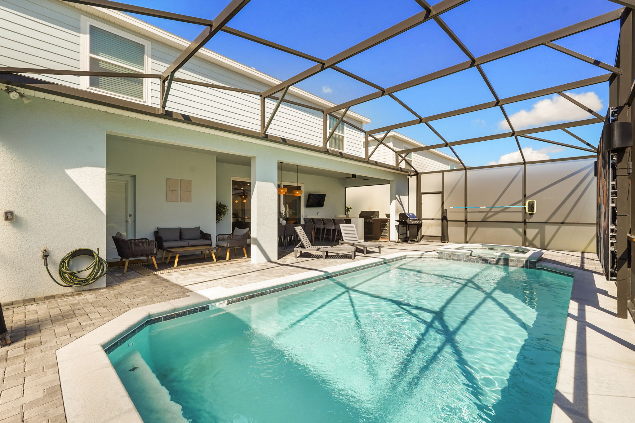 Outdoor LED Screen + Private Screened-in Pool + Child Safety Pool Fence — 15922 Cape Coral Loop, photo 57 of 115