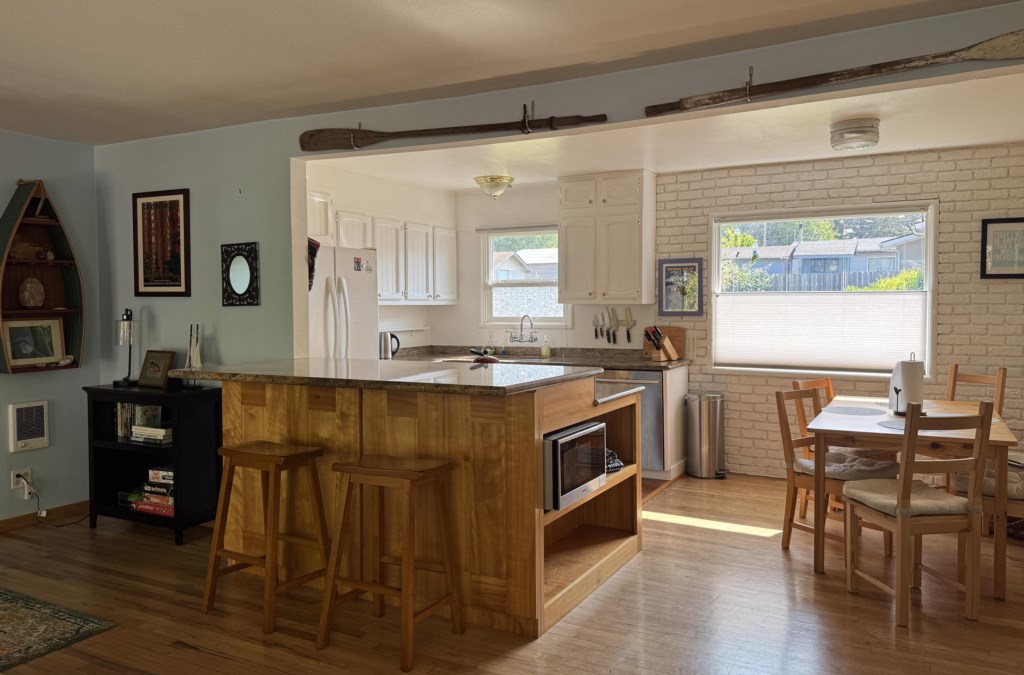 Looking at kitchen and dining area