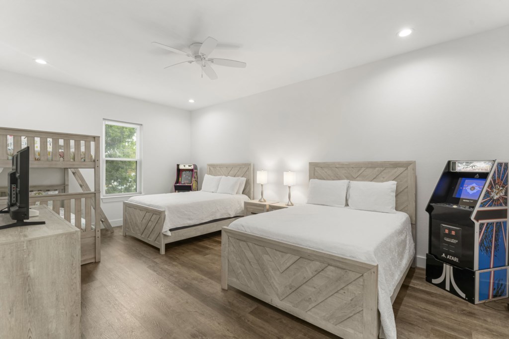 Guest Bedroom With Two Queen Beds, Three Twin Beds, Arcade Games, and Private Bathroom On 2nd Floor