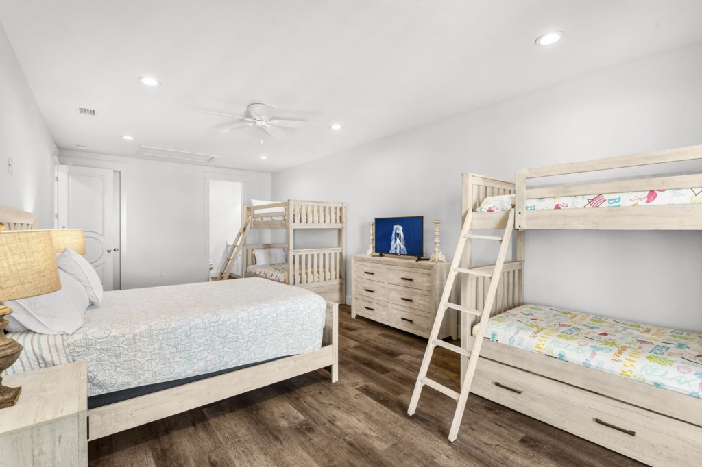 Guest Bedroom With Queen Bed, Six Twin Beds, and Private Bathroom On 2nd Floor