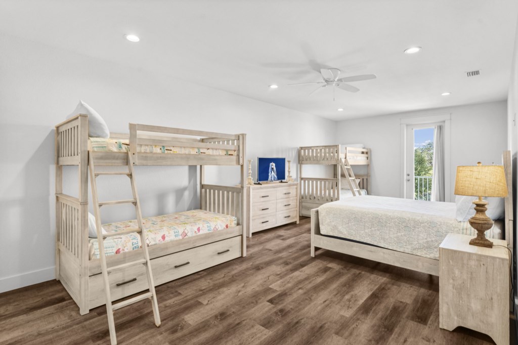 Guest Bedroom With Queen Bed, Six Twin Beds, and Private Bathroom On 2nd Floor
