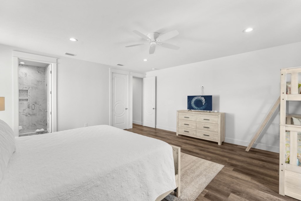 Guest Bedroom With Queen Bed, Three Twin Beds, and Private Bathroom On 2nd Floor