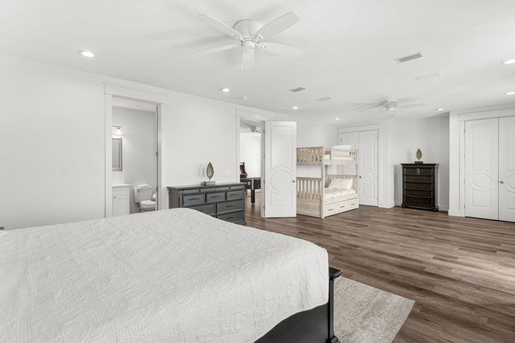 Guest Bedroom With King Bed, Three Twin Beds, and Private Bathroom On 3rd Floor