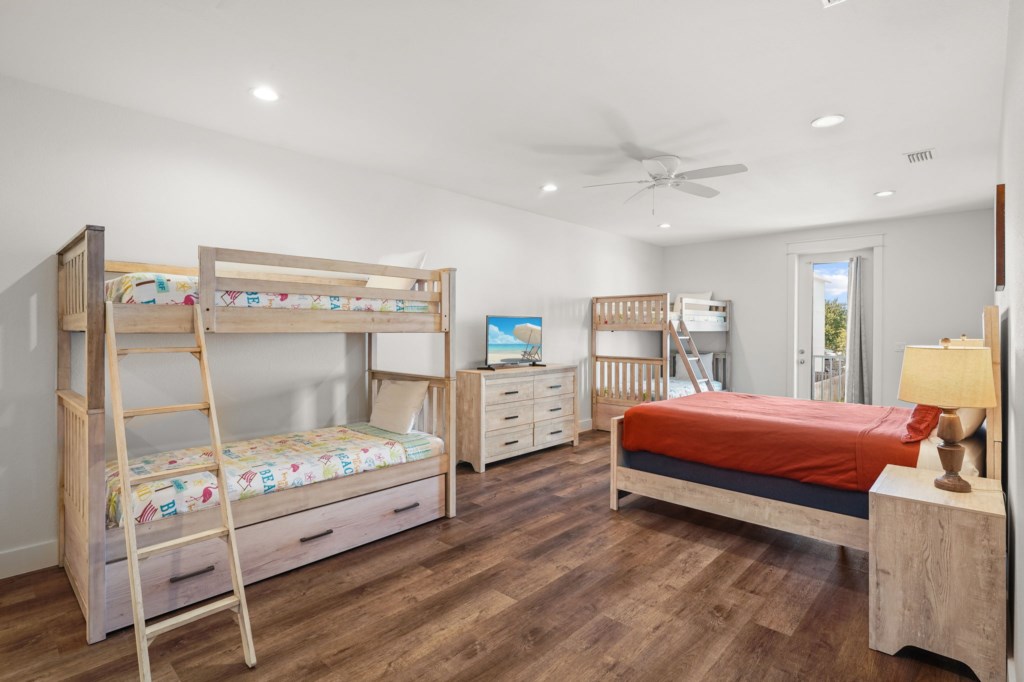 Guest Bedroom With Queen Bed, Six Twin Beds, and Private Bathroom On 2nd Floor
