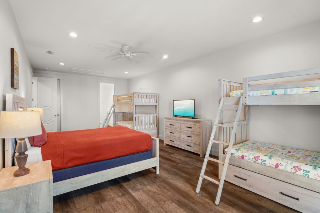 Guest Bedroom With Queen Bed, Six Twin Beds, and Private Bathroom On 2nd Floor