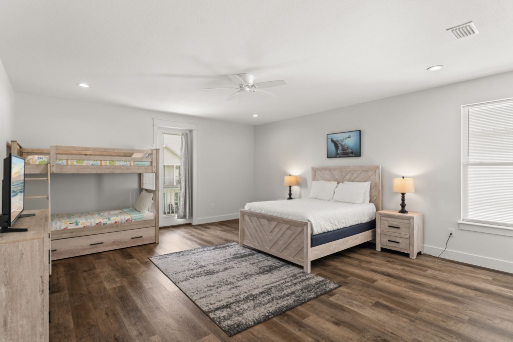 Guest Bedroom With Queen Bed, Three Twin Beds, and Private Bathroom On 2nd Floor