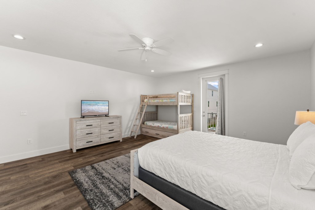 Guest Bedroom With Queen Bed, Three Twin Beds, and Private Bathroom On 2nd Floor