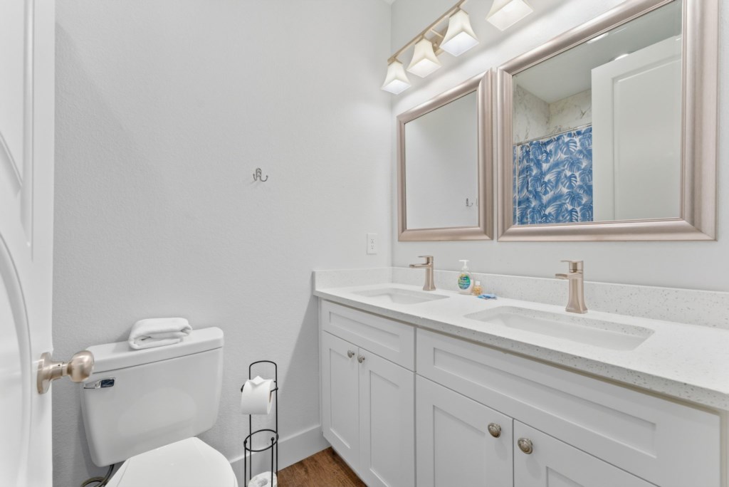 Guest Bedroom With Queen Bed, Six Twin Beds, and Private Bathroom On 2nd Floor