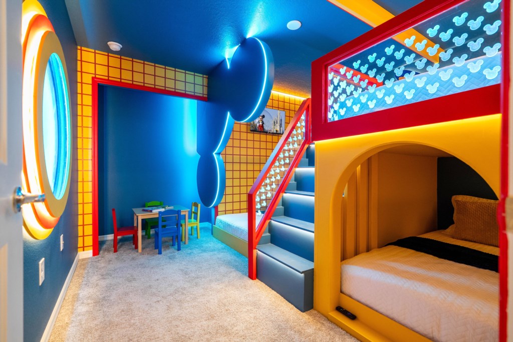 Mickey themed bedroom w/ 2 full + twin bed
