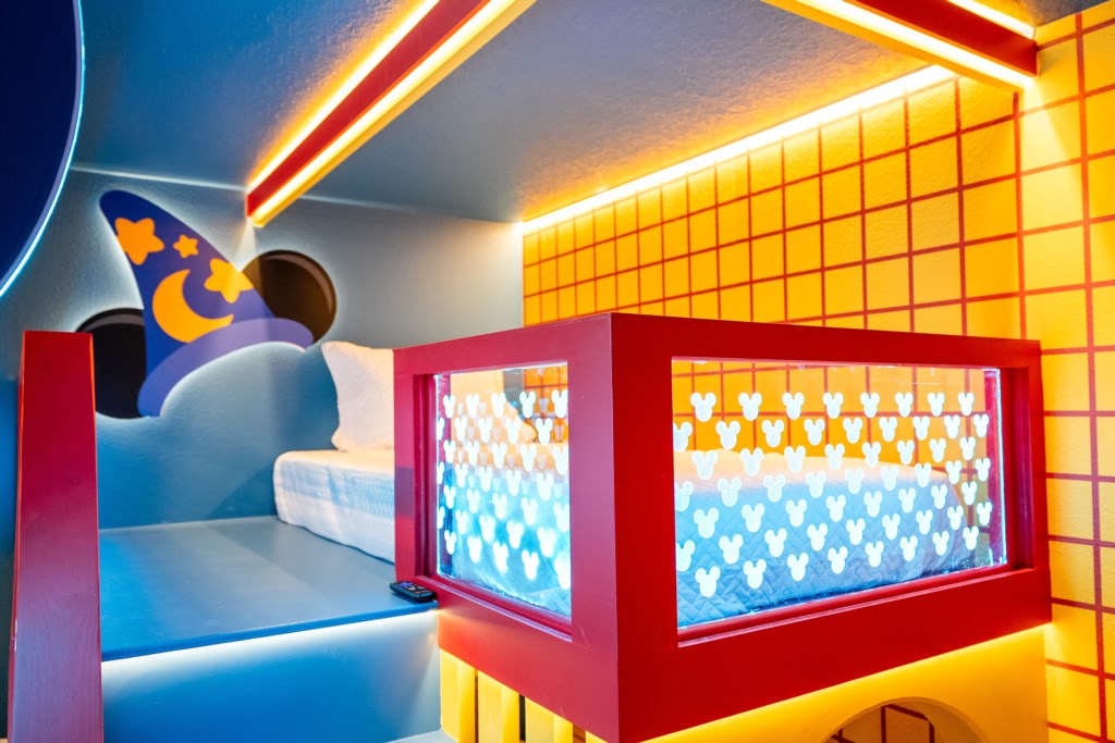 Mickey themed bedroom w/ 2 full + twin bed