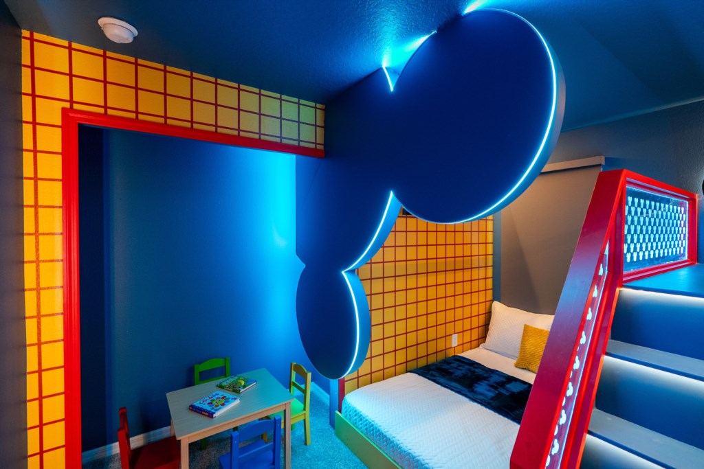 Mickey themed bedroom w/ 2 full + twin bed