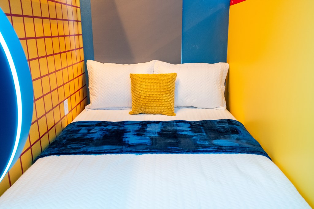 Mickey themed bedroom w/ 2 full + twin bed