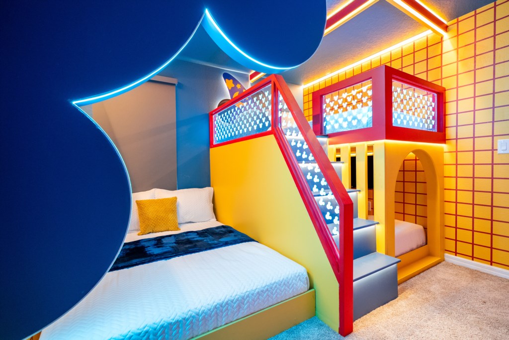 Mickey themed bedroom w/ 2 full + twin bed