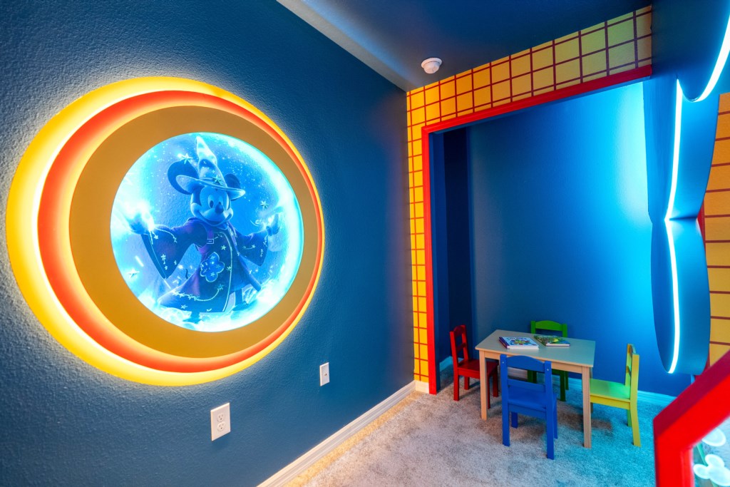 Mickey themed bedroom w/ 2 full + twin bed