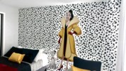 Unique bedroom featuring a vivid Cruella de Vil wall mural, perfect for Disney fans.