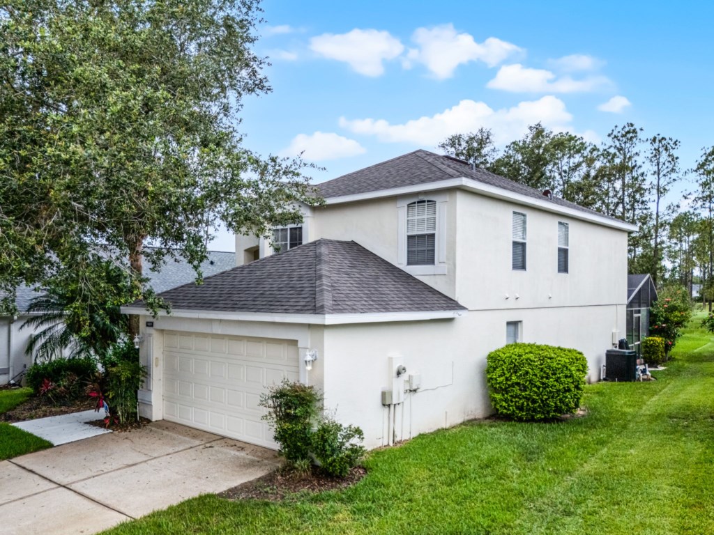 1-web-or-mls-909 Troon Cir-Davenport, FL 33897 - 01.jpg