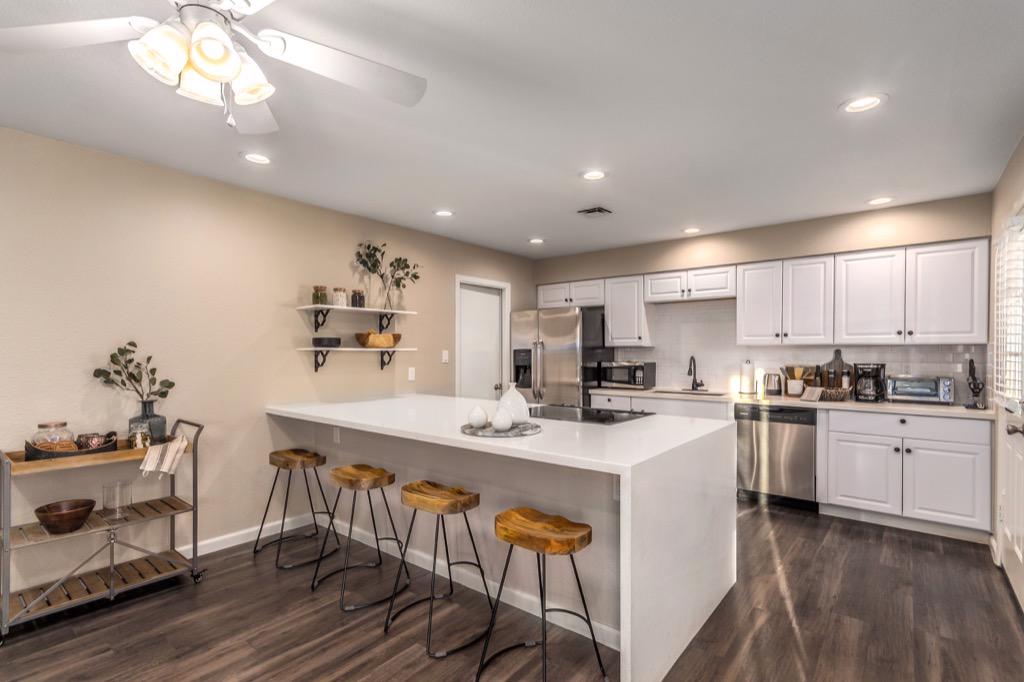 Modern kitchen with a spacious island and bar seating perfect for breakfast.