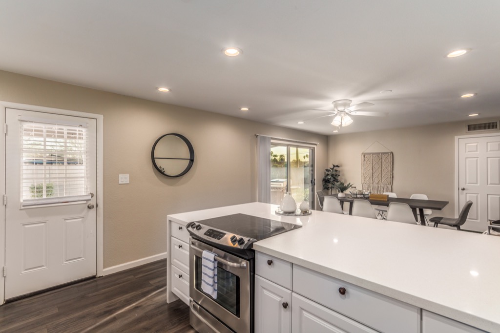 Modern kitchen with large island, perfect for preparing family meals.