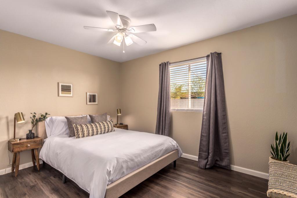 Airy bedroom with a soothing neutral palette, perfect for a restful sleep.