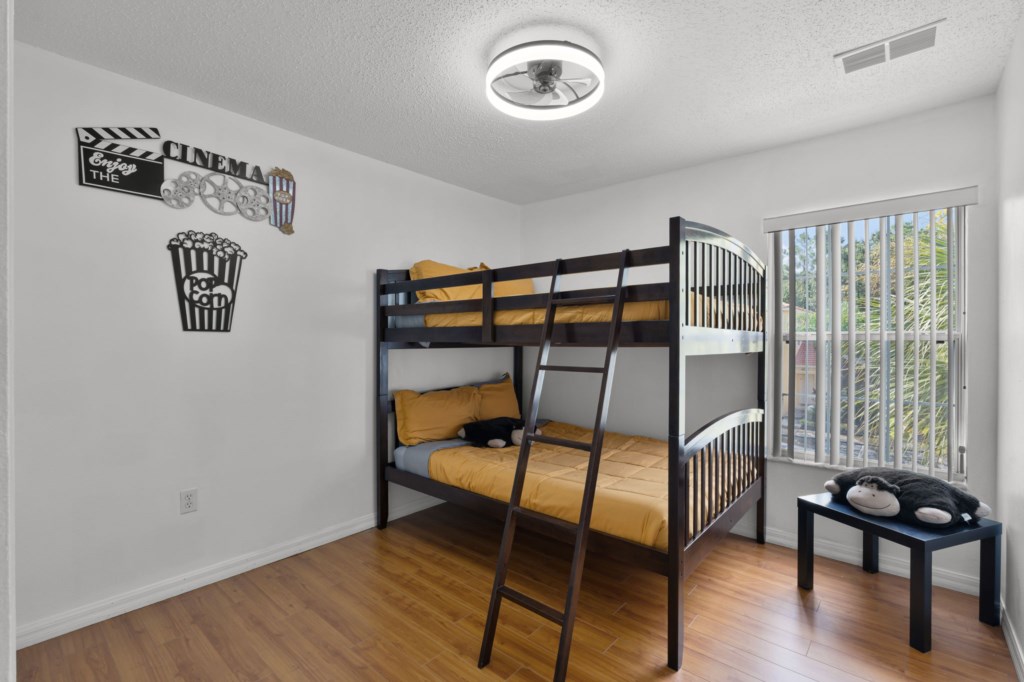 Cozy bedroom , bunk beds, with two Full Beds.