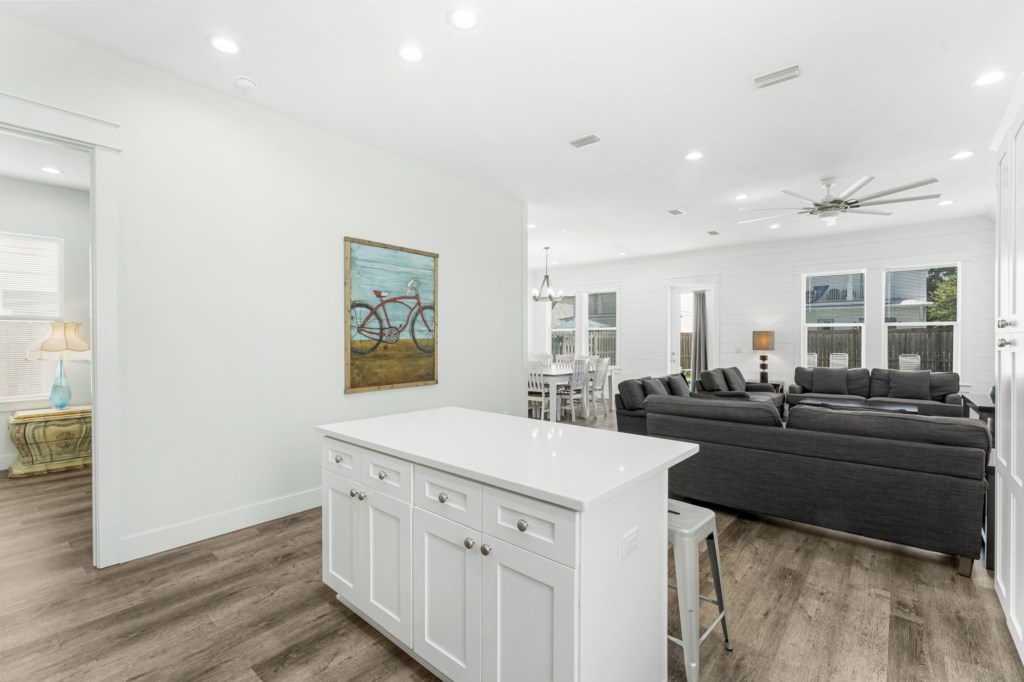 Spacious kitchen and open concept living area that leads to the pool