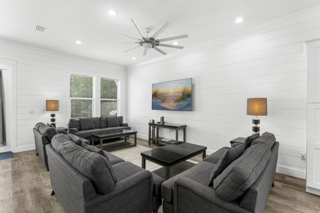 Spacious kitchen and open concept living area that leads to the pool