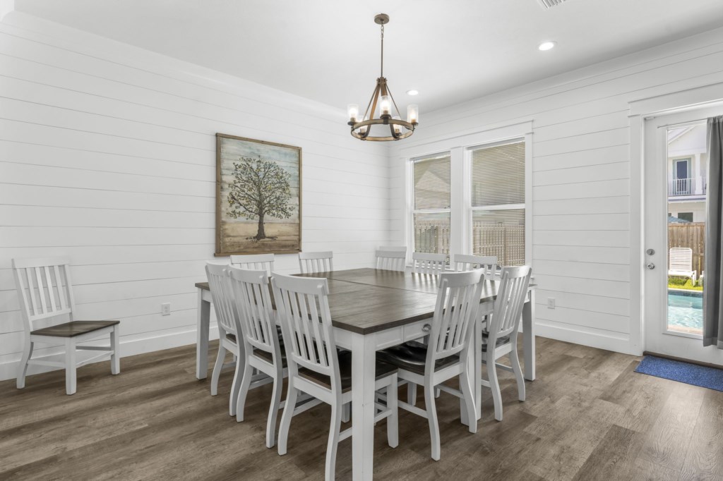 Spacious kitchen and open concept living area that leads to the pool