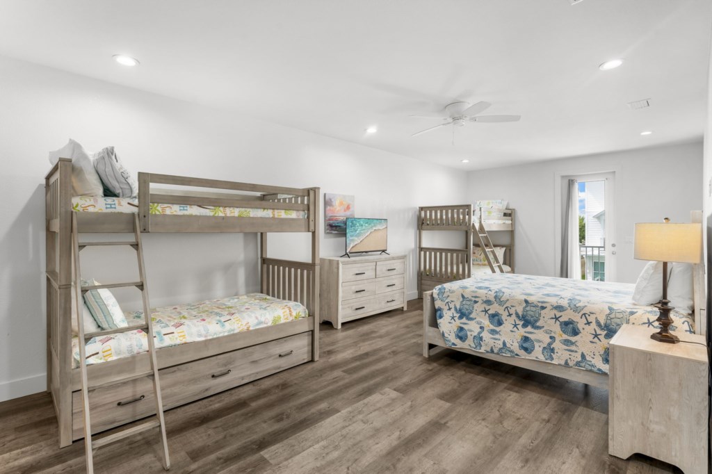 Guest Bedroom With Queen Bed, Six Twin Beds, and Private Bathroom On 2nd Floor