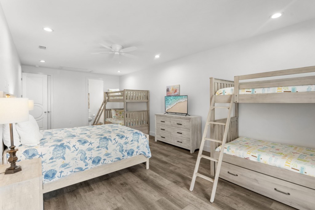 Guest Bedroom With Queen Bed, Six Twin Beds, and Private Bathroom On 2nd Floor
