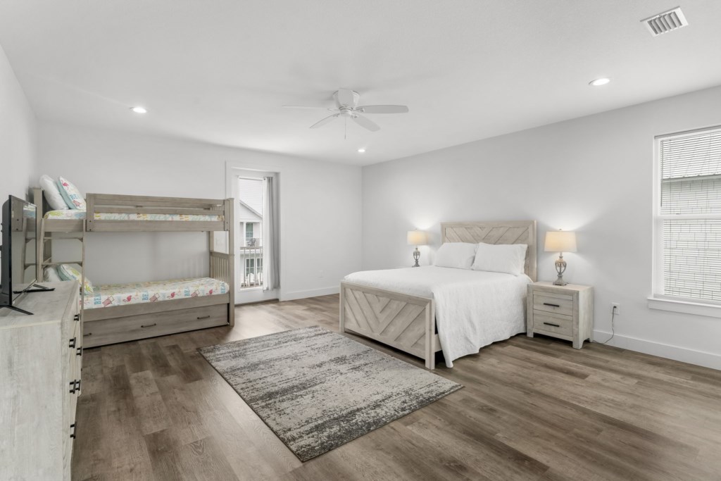 Guest Bedroom With Queen Bed, Three Twin Beds, and Private Bathroom On 2nd Floor