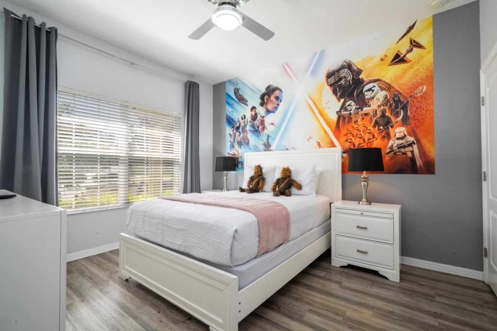 1st floor bedroom w/ queen bed and flat screen TV