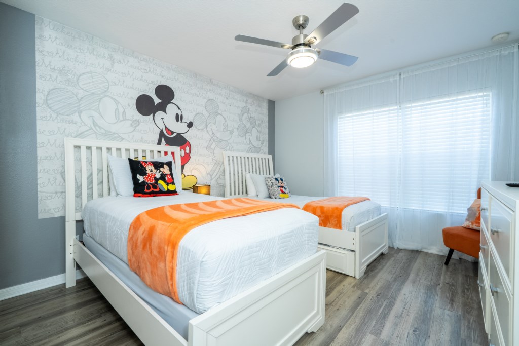 Mickey themed bedroom w/ 2 singles beds + flat screen TV