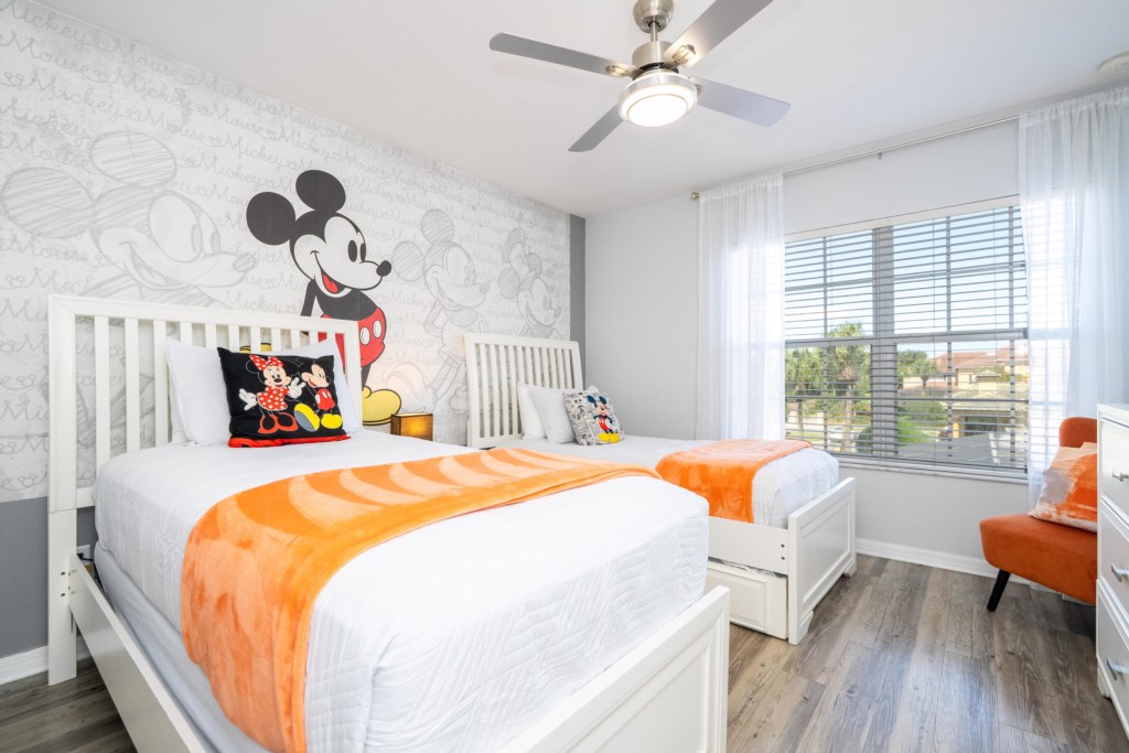 Mickey themed bedroom w/ 2 singles beds + flat screen TV