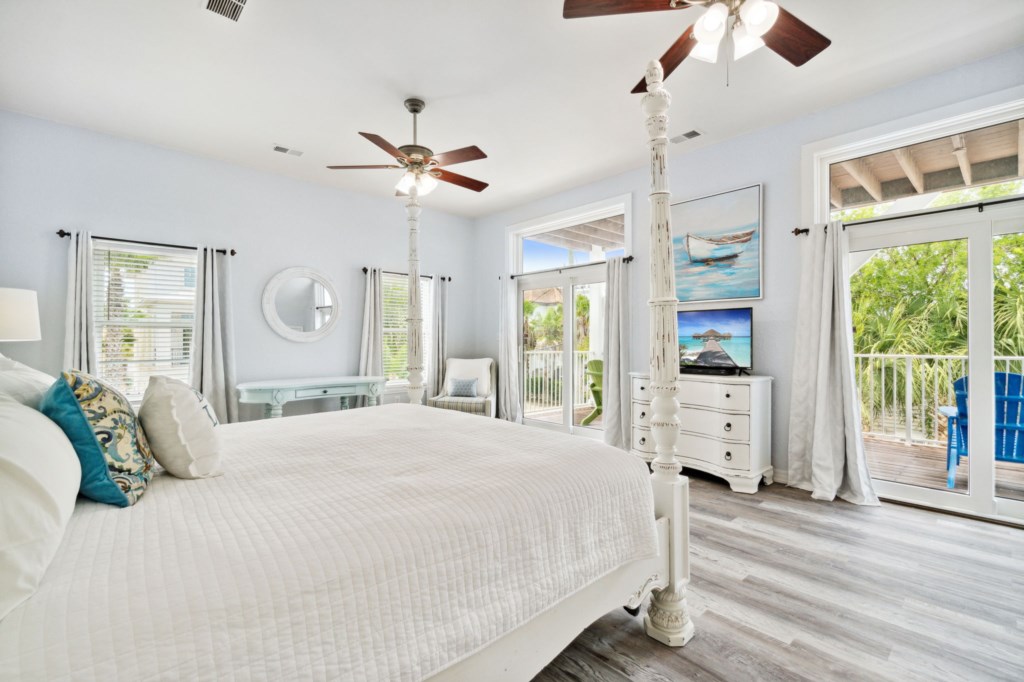 Level 2 King Bedroom with Balcony overlooking Pool, connecting Bathroom