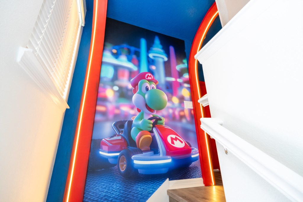 Mario themed loft area converted to a game room
