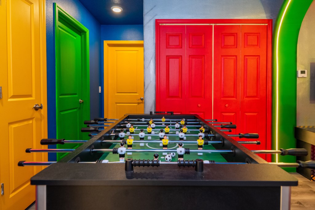Mario themed loft area converted to a game room w/ Foosball & Arcade