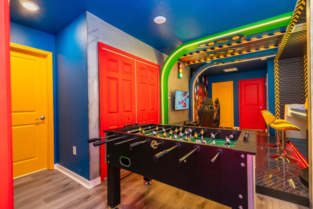 Mario themed loft area converted to a game room w/ Foosball & Arcade