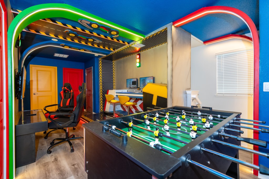 Mario themed loft area converted to a game room w/ Foosball & Arcade