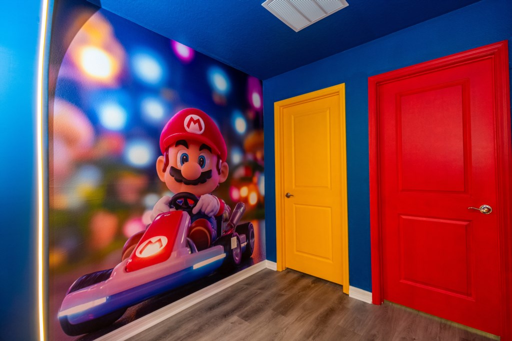 Mario themed loft area converted to a game room w/ Foosball & Arcade